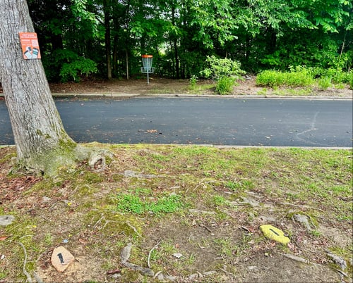 Hole #1 crosses the service road (watch out for passing cars).