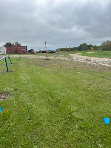 Hole 3: Beyond fence and gravel road out of bounds.

