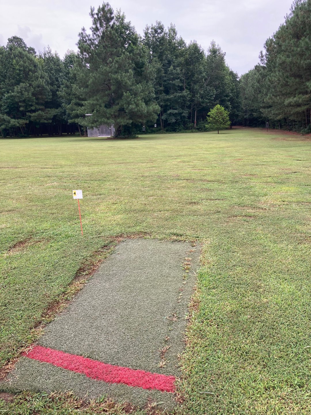 4x tee pad,  basket is right of maintenance shed. 