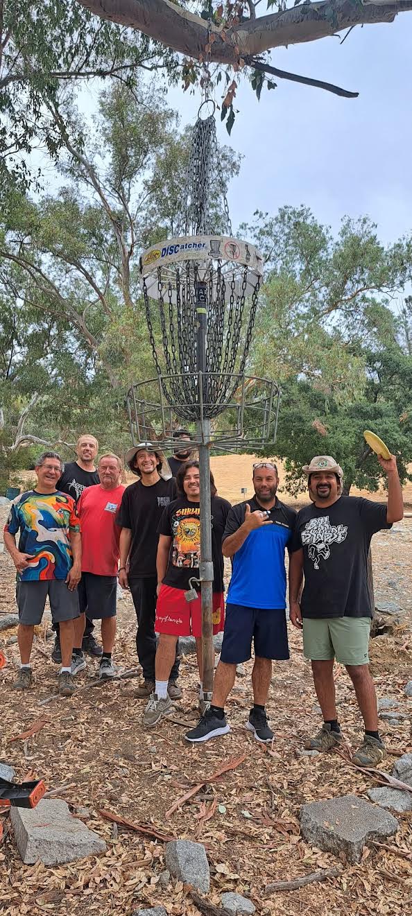 The team that installed the hanging basket.
