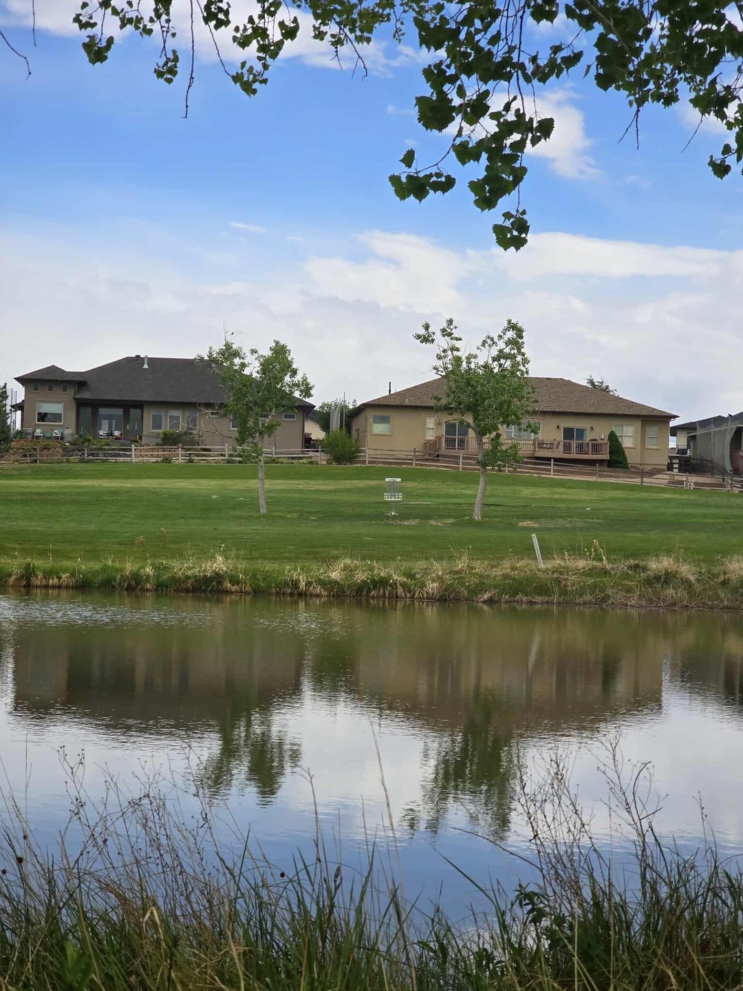 Hole 18, carry the pond.