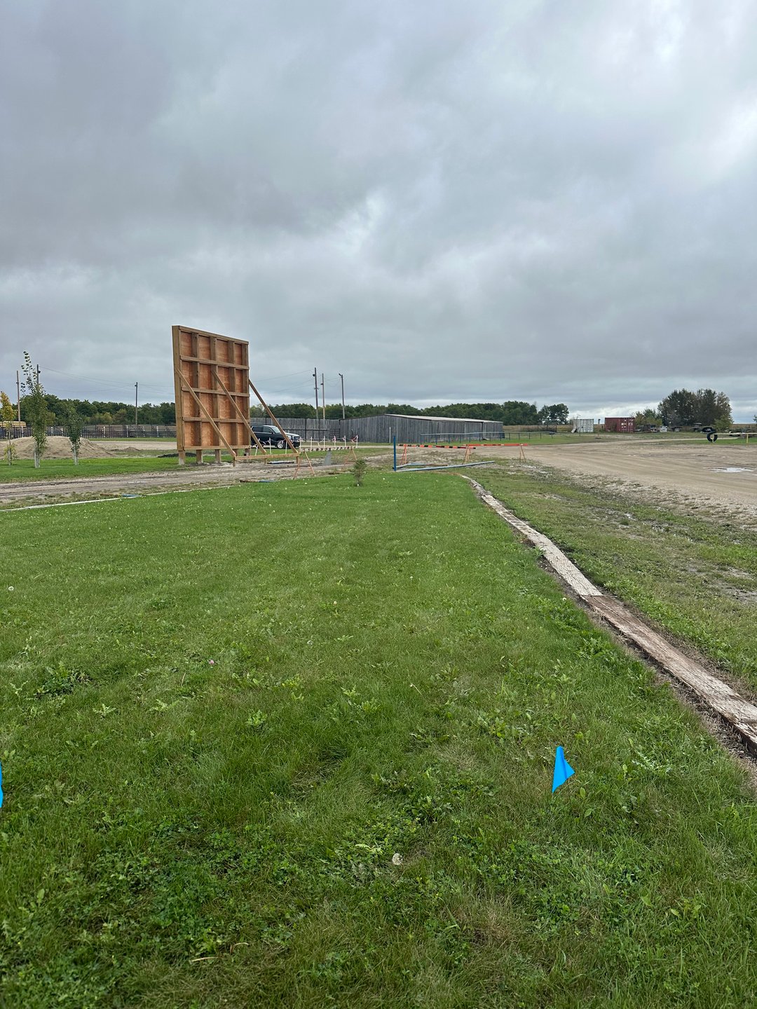 Hole 2: Gravel Road is out of bounds. 

For added difficulty:  One stroke penalty if rodeo wall is hit. 