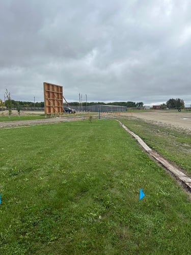 Hole 2: Gravel Road is out of bounds. 

For added difficulty:  One stroke penalty if rodeo wall is hit. 