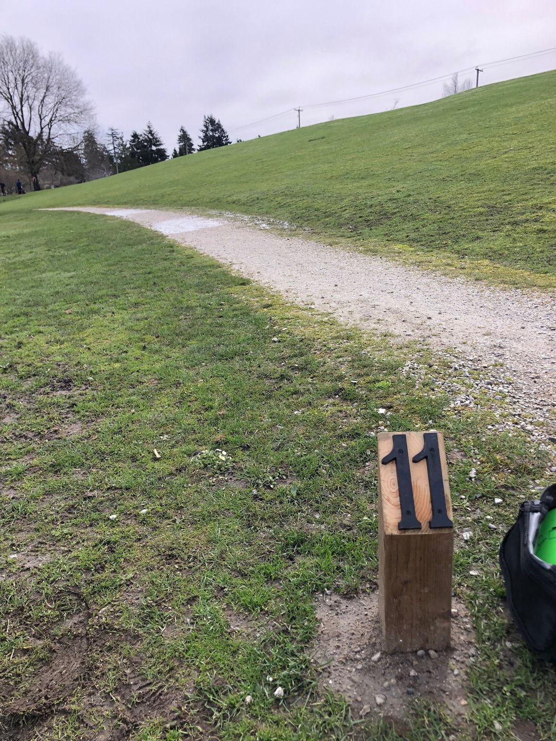 Tee 11 at the bottom of the hill by the path. 