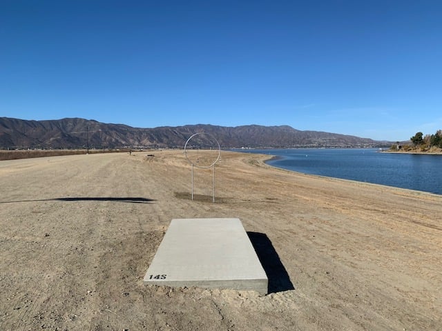 HOLE 14 SHORT TEE PAD, "THE WINDOW", RE-TEE EACH MISS AND TAKE A STROKE.