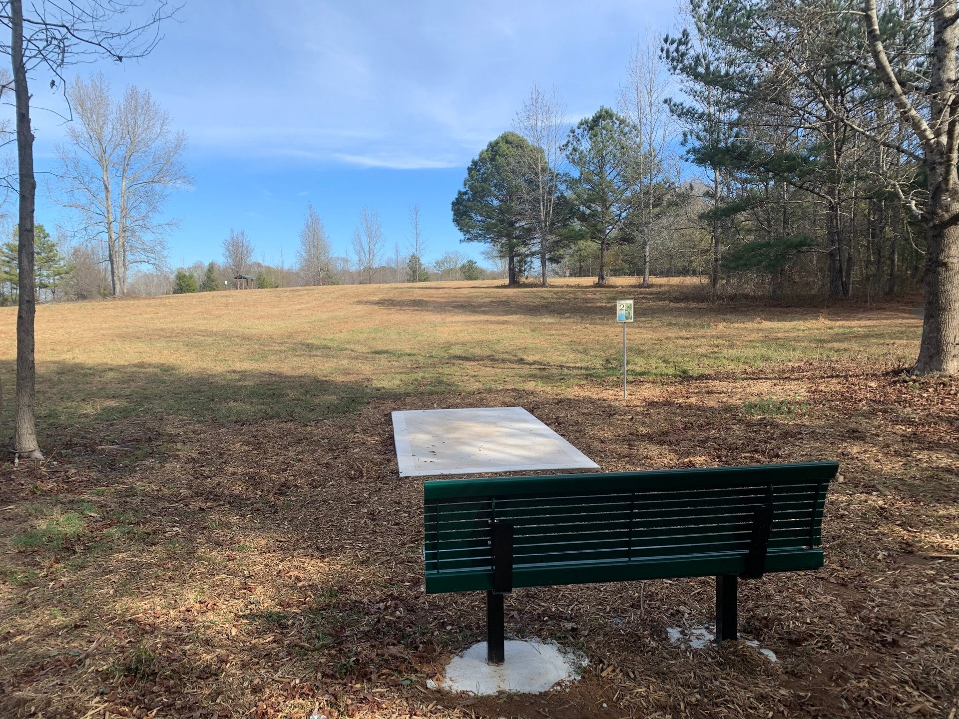 Hole 2 Red tee pad and fairway. 