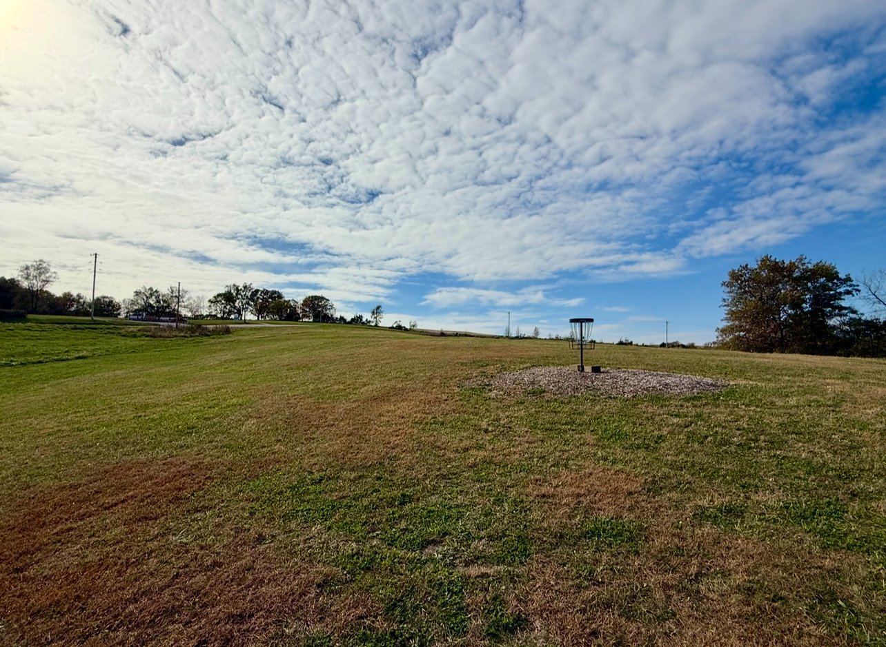 Hole 9 - Short Pin (always in) and fairway looking up to Pro pin. 