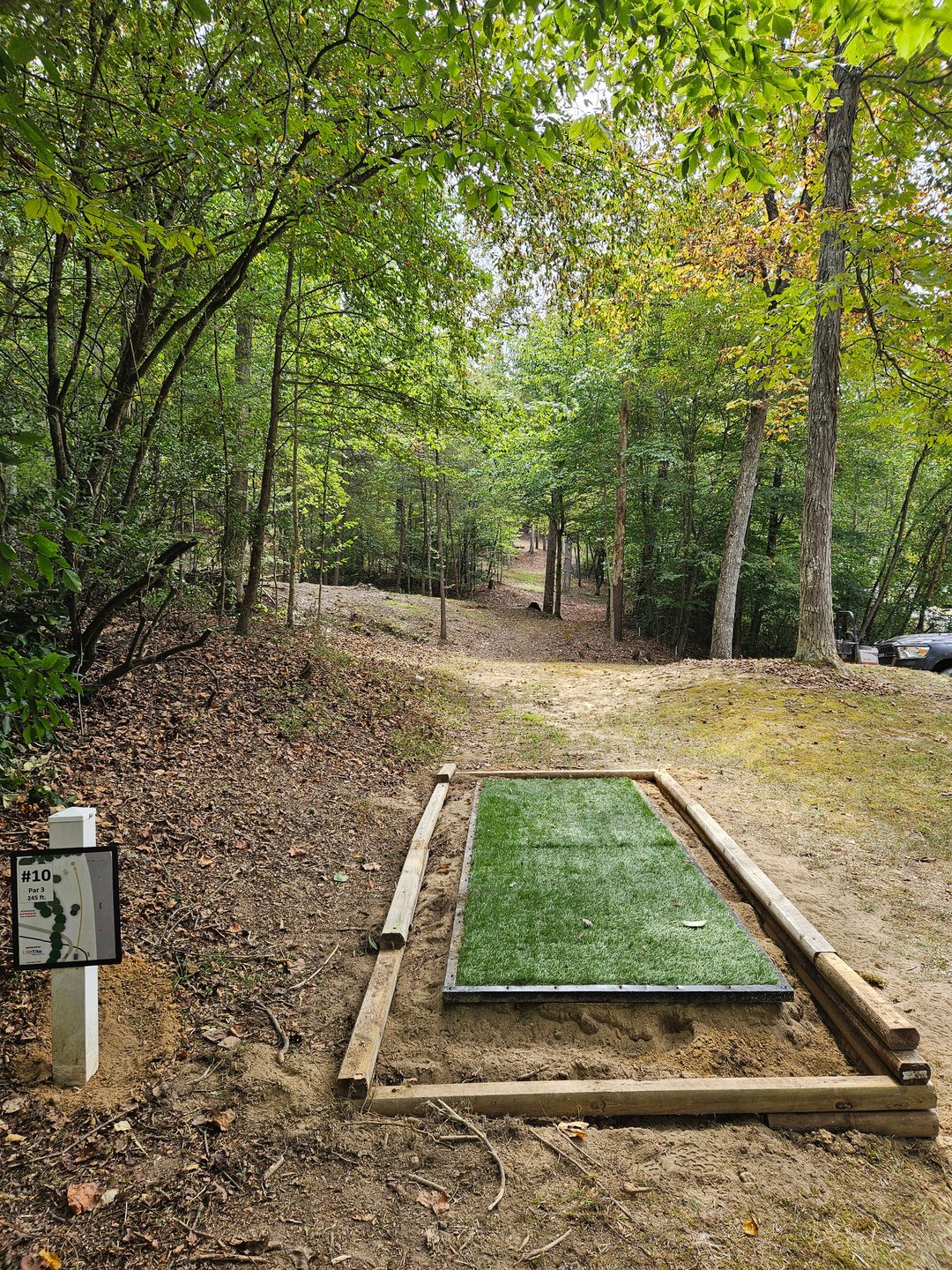 Hole 10 Short Teepad. Short Basket Straight, Long Basket Straight then Right.