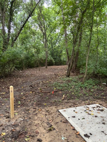 Miami Whitewater Forest, Cincinnati Ohio.  Fairway 2  through the foliage without removing any trees over 4” diameter.  Tee pad 5’ x 12’.  Sign posts installed.  Fairway still needs raked and seeded.  