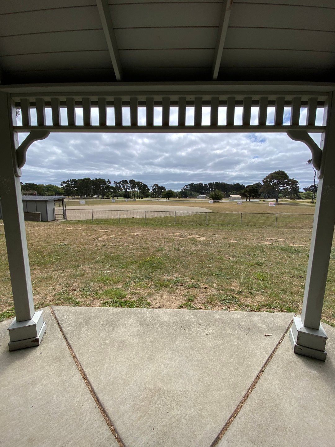 View from Tee pad (Gazebo) for hole 10A toward basket past ball field.