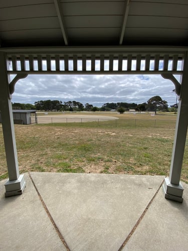View from Tee pad (Gazebo) for hole 10A toward basket past ball field.