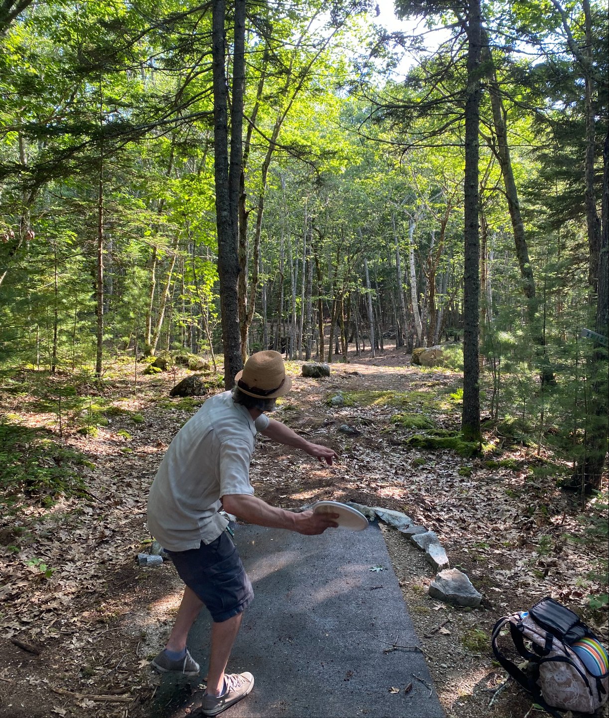 Downhill flex right - basket atop boulder