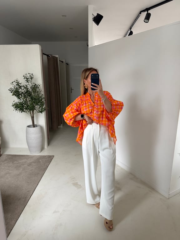 Blouse à carreaux orange et rose