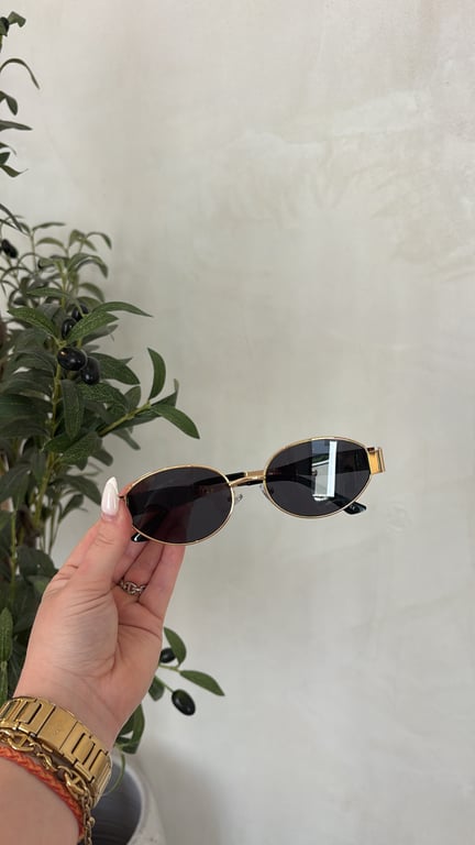 Lunettes de soleil avec branches épaisses dorées — vue alternative