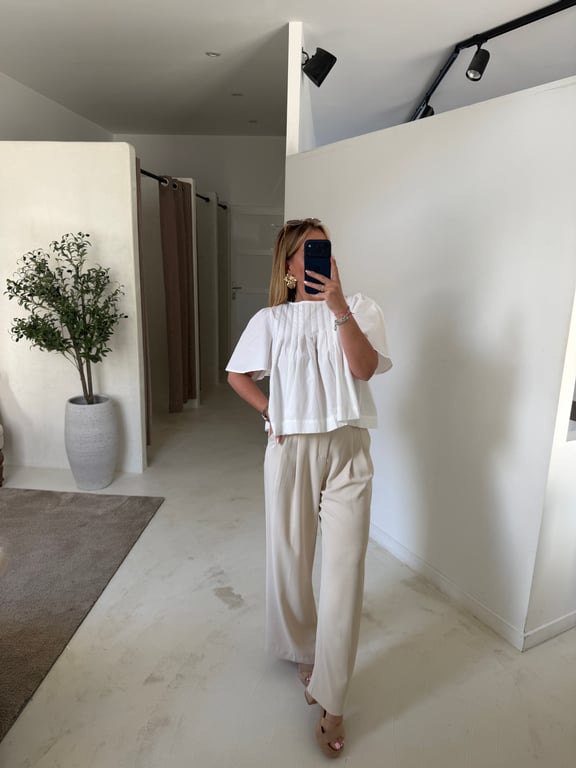 Blouse blanche plissée