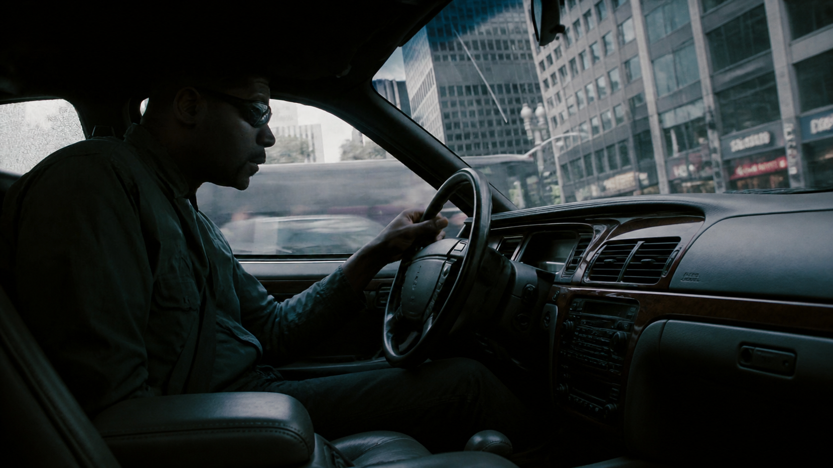 Film still from Heat showing Neil McCauley driving through downtown Los Angeles.