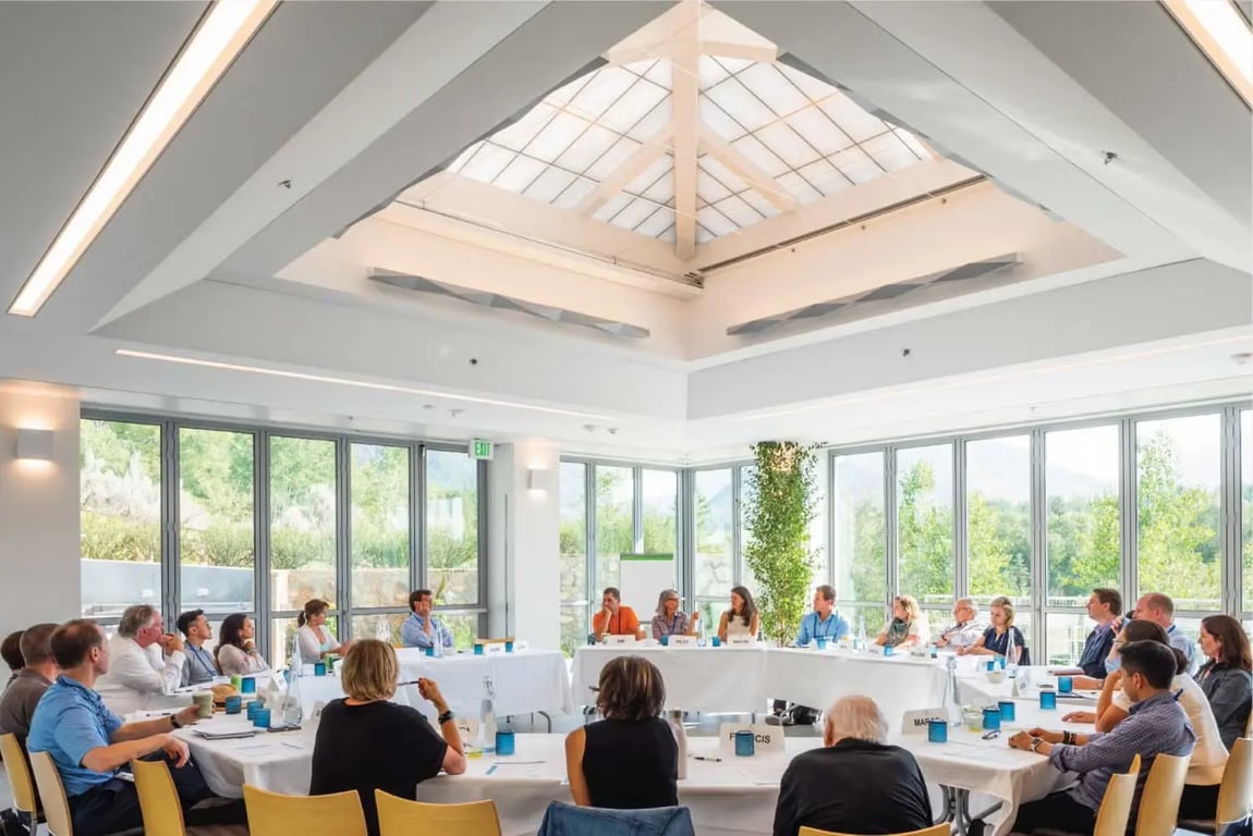 Attendees around a round open table at the Aspen Institute Italia Executive Seminar
