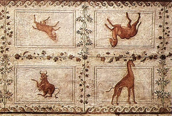 Ancient Roman mosaic depicting a bull, giraffe, and two other animals in separate panels with decorative borders.