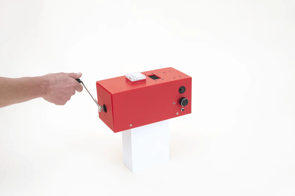 Hand cranked AI prototype with a crank on the side