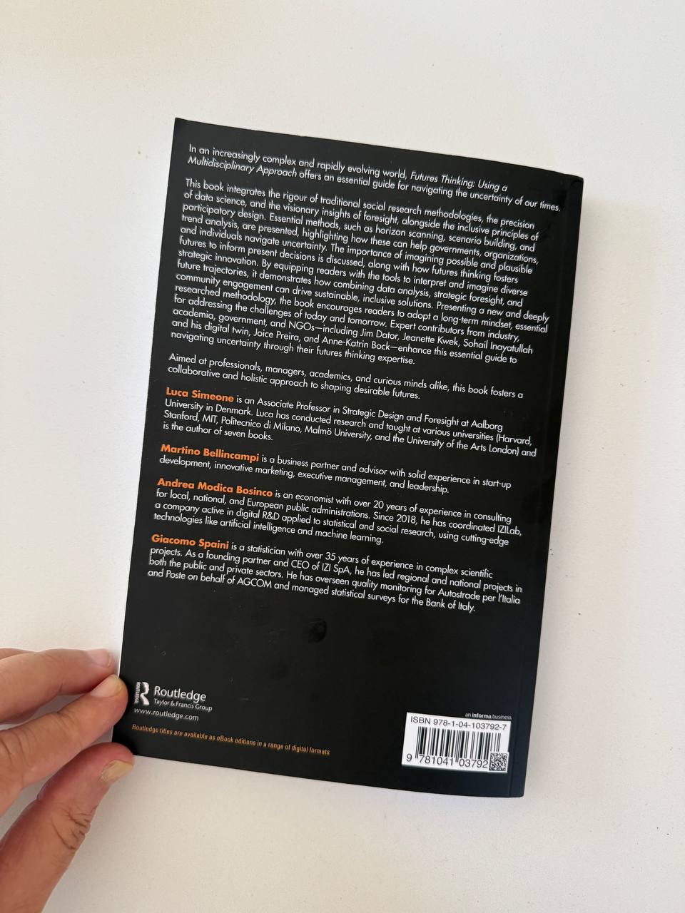Back cover of Futures Thinking: Using a Multidisciplinary Approach, showing the book description and contributor biographies.