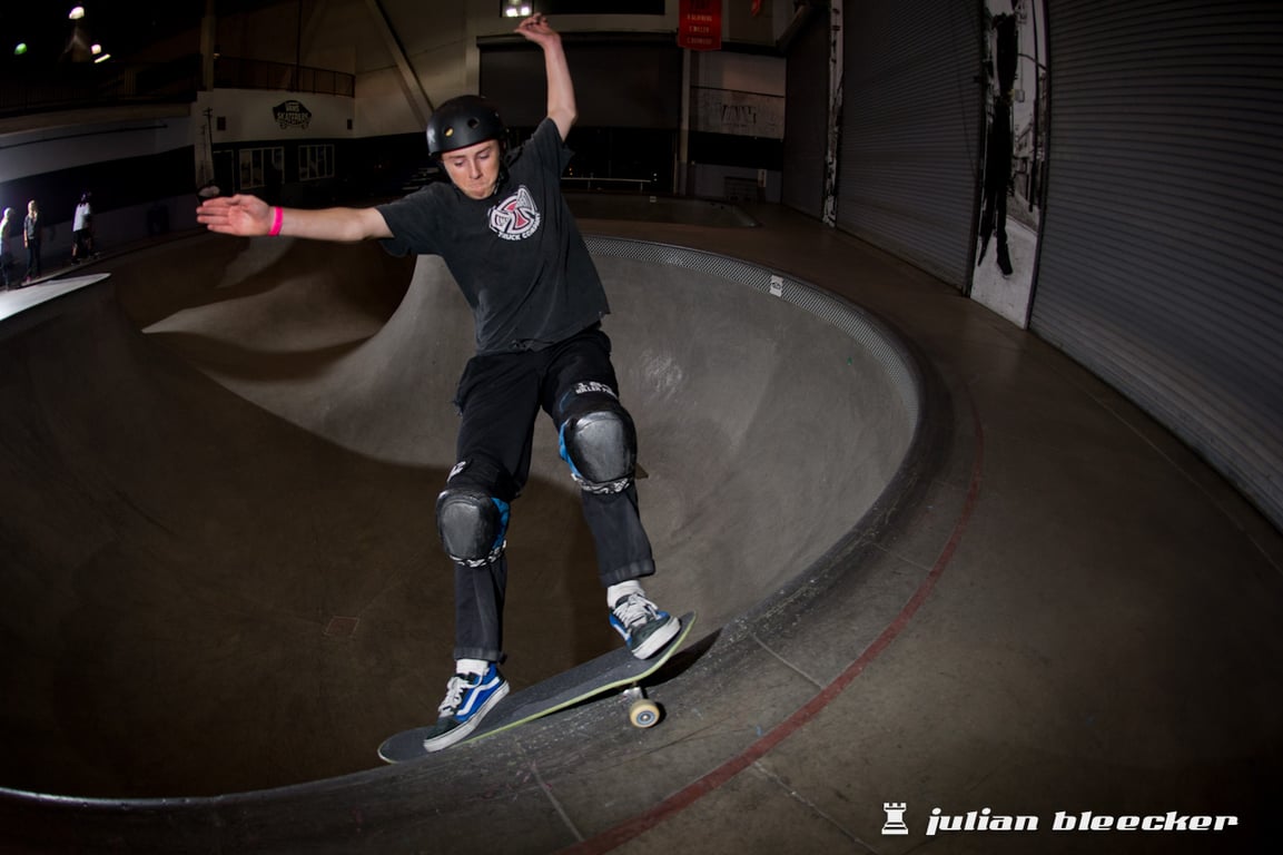 Chris Russell performing a Smith grind.