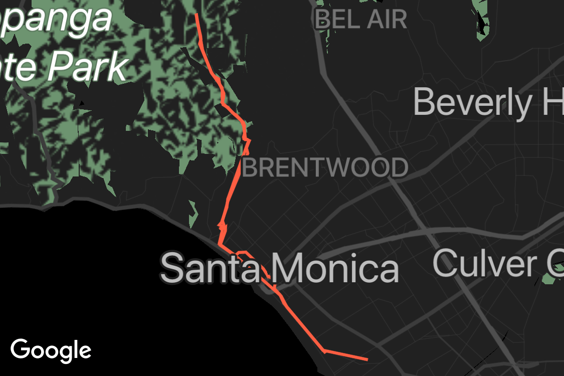 OMATA map-style study with an orange-red route, black ocean, shaded green terrain and large labels for Santa Monica and Brentwood.