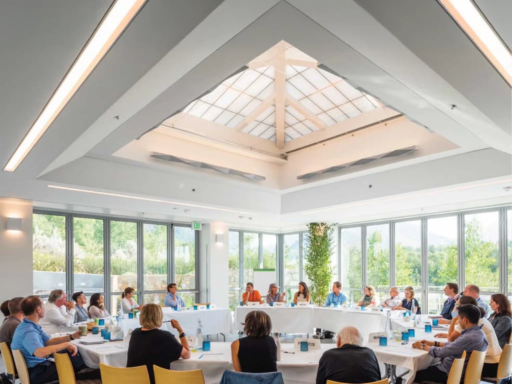 Attendees around a round open table at the Aspen Institute Italia Executive Seminar