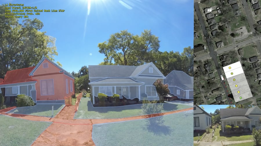 view of houses scanned by surveillance cameras style video