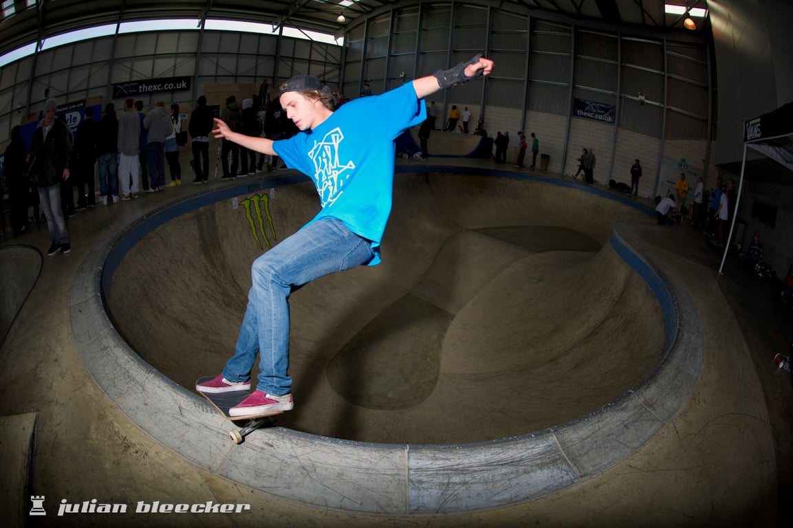 Jake Collins performing a Smith grind.