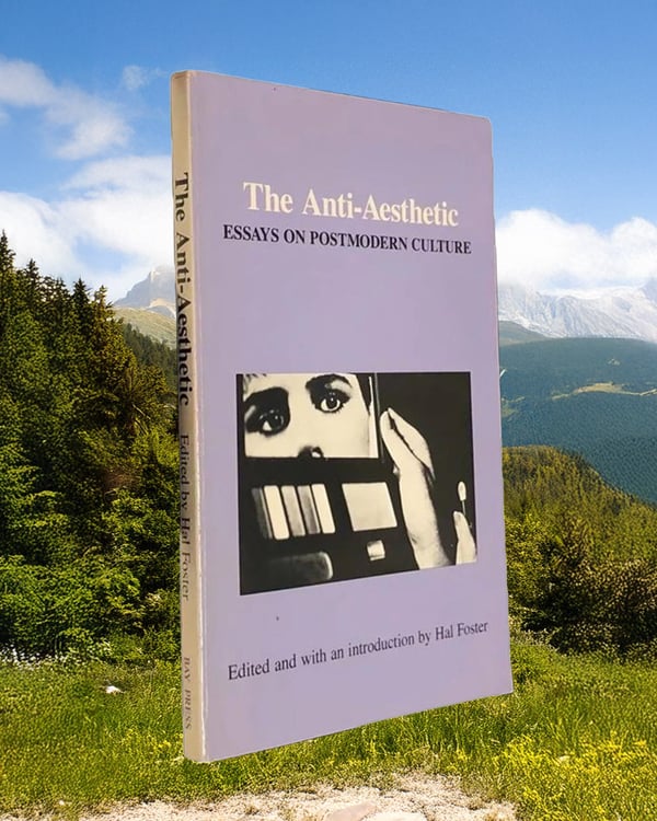Book cover of “The Anti-Aesthetic: Essays on Postmodern Culture” against a mountainous landscape.