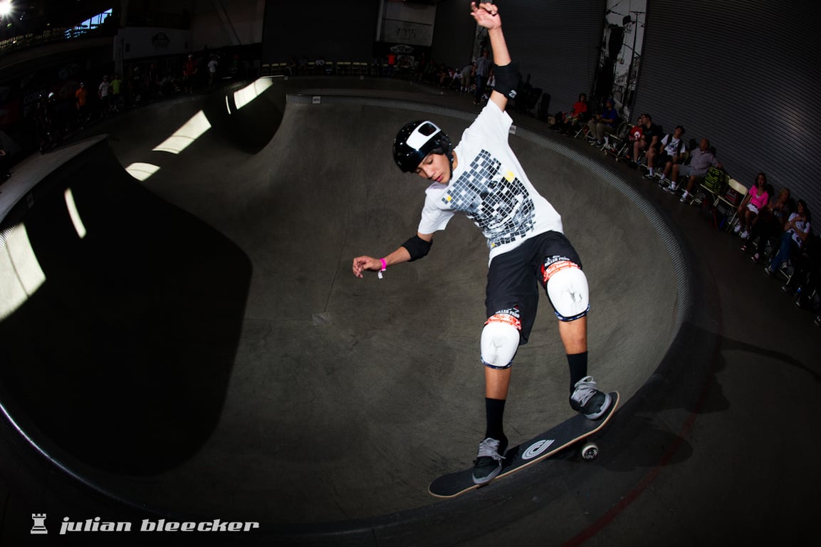 Austin Poynter performing a Smith grind.