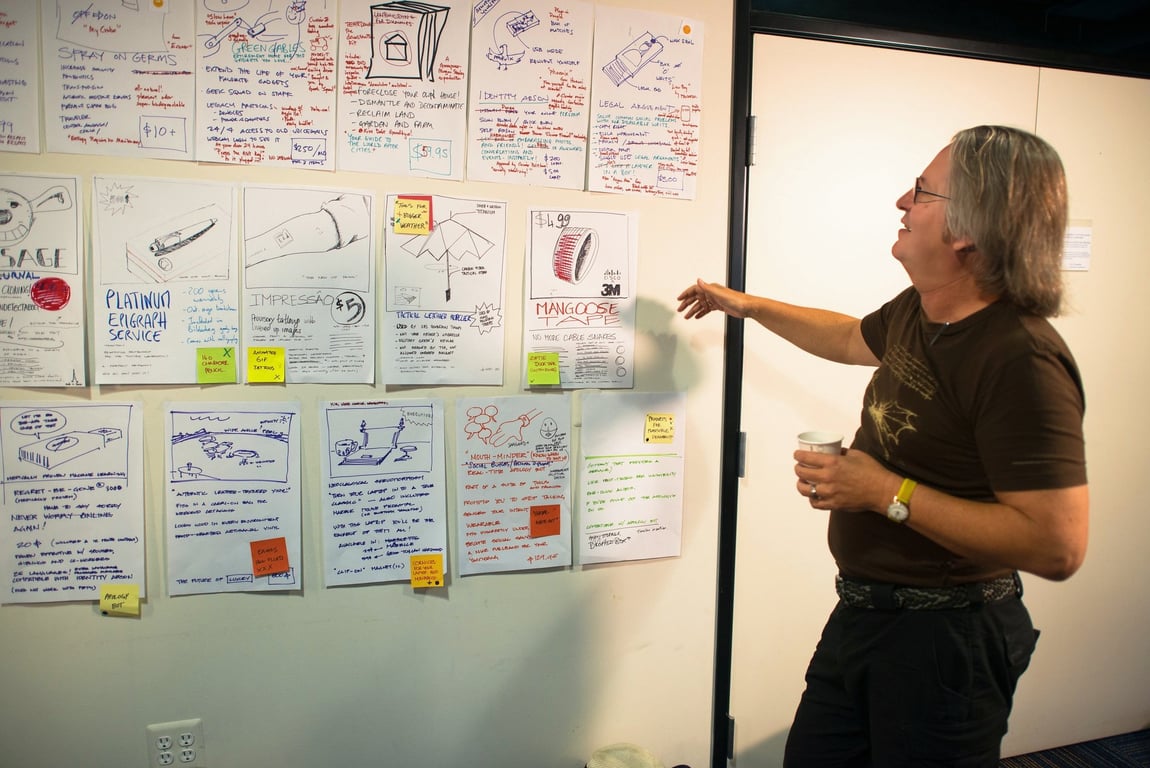 Bruce Sterling in front of grounded Design Fiction speculations of futures products