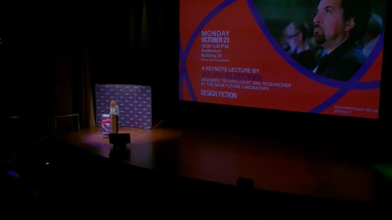 Image of the stage while Julian Bleecker is giving a Keynote on Design Fiction