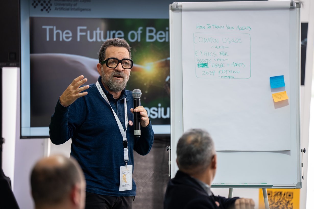 A picture of Julian Bleecker speaking at the symposium The Future of Being Human at MBZUAI in Abu Dhabi November 20-22 2025 hosted by Elizabeth Churchill
