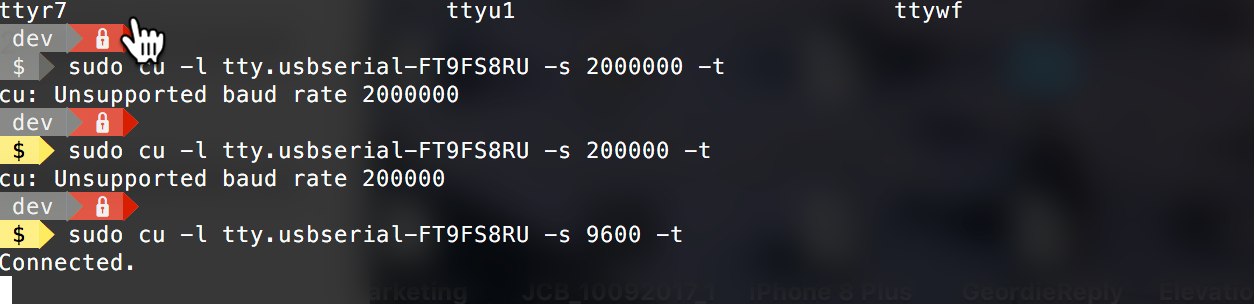 A terminal showing two unsupported serial baud rates followed by a successful connection at 9600 baud.
