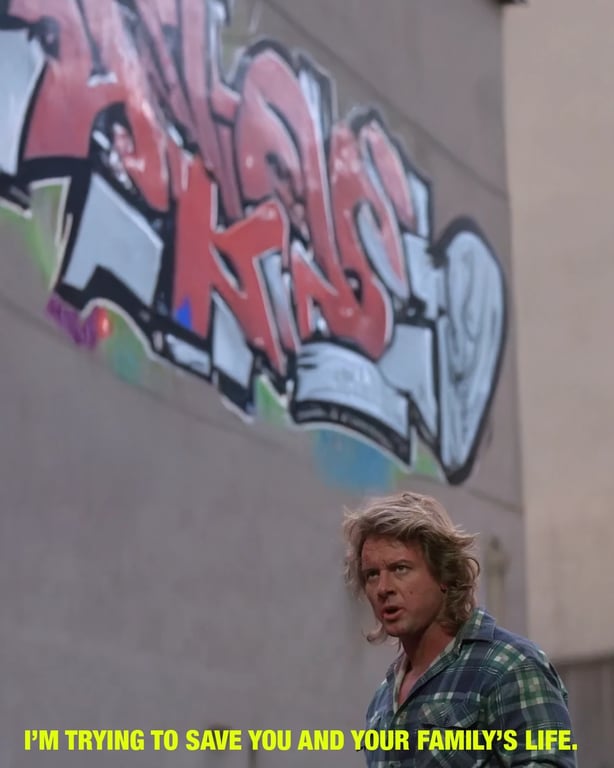 A scene from John Carpenter's They Live depicting a fight between two characters representing the struggle between Imagination and Structure