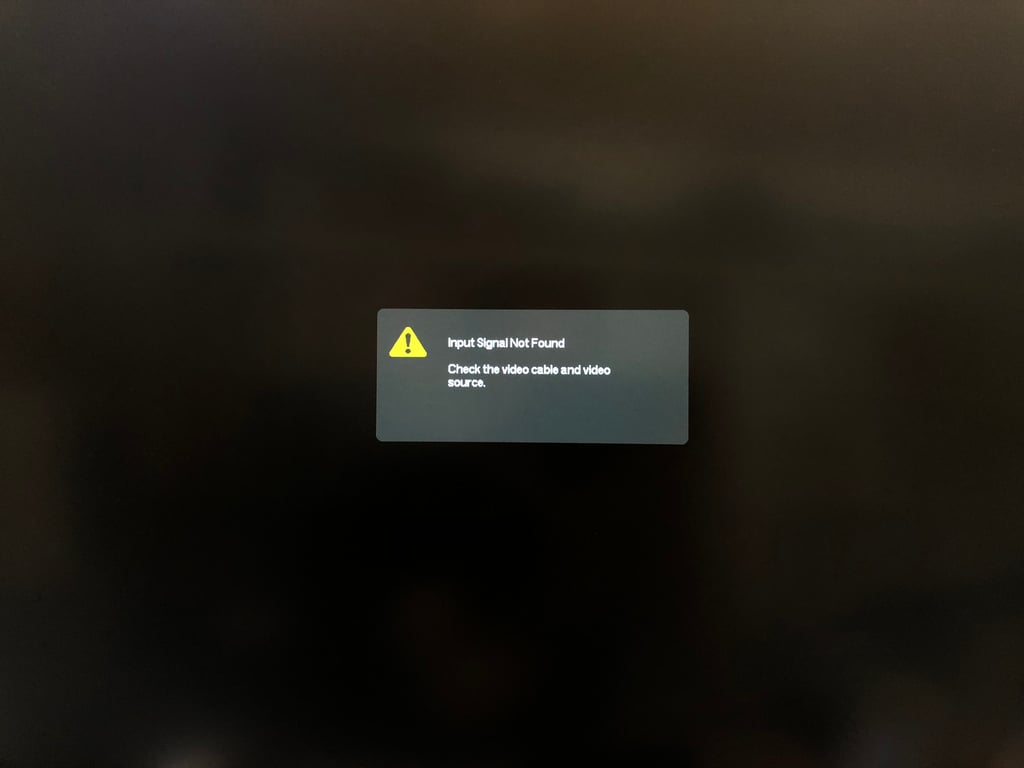 Another interruption: the monitor reports Input Signal Not Found.