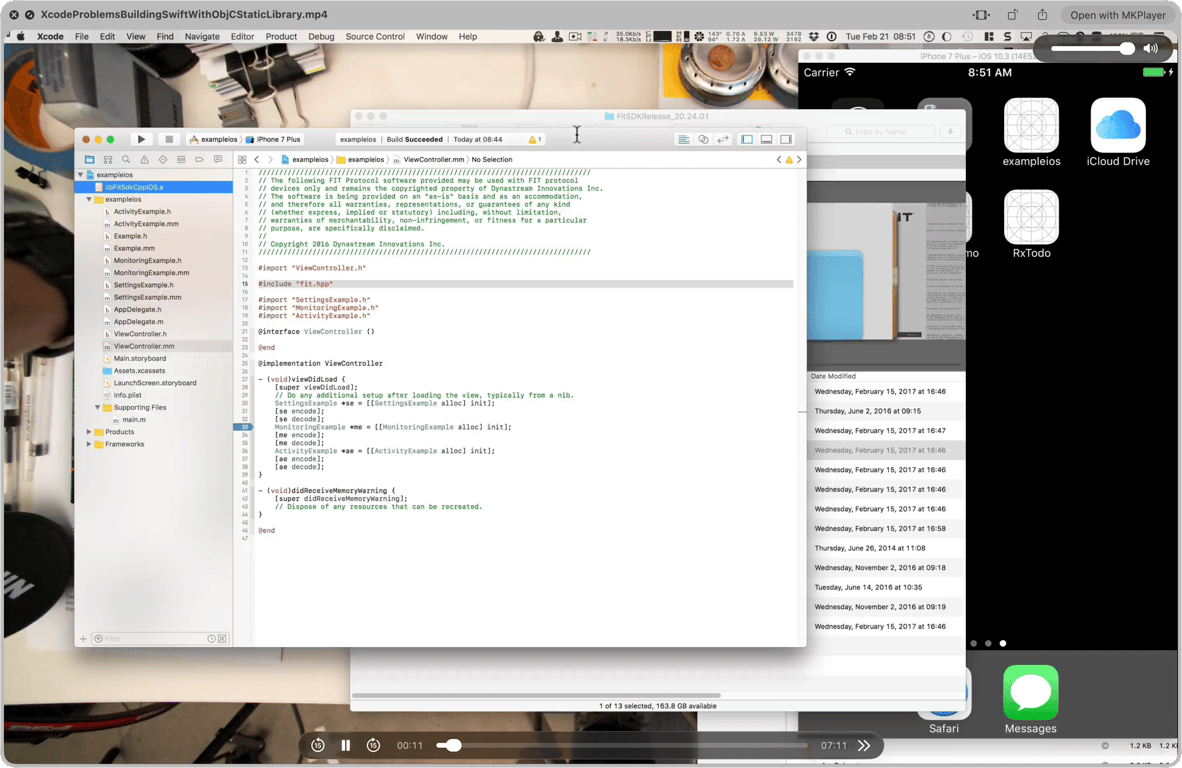 A frame from my screen recording: Xcode shows the FIT SDK Objective-C++ example and a successful build, with an iPhone simulator behind it.