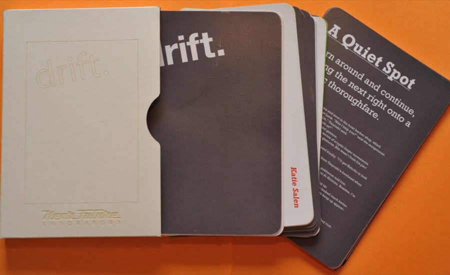 An image of the Drift Deck cards splayed out on an orange background