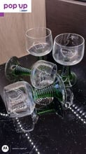 4 броя кристални чаши а вино със зелено, оребрено столче.