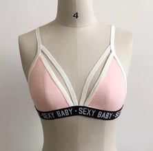Ново розово бюстие с ленти и ластик с надпис SEXY BABY налично в S M L XL размер !