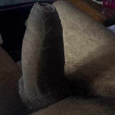 Beautiful thick dark dick pic with hairy thighs.