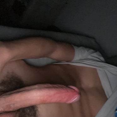 A beautiful, thick cock with a hairy bush and smooth skin, about 16cm.