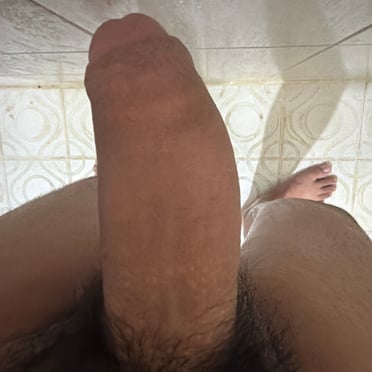Here is a picture of a thick, veiny cock with hairy balls from a muscled stud.