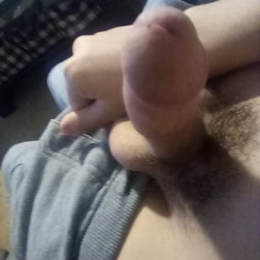 Thick white cock with hairy balls, close up pic.
