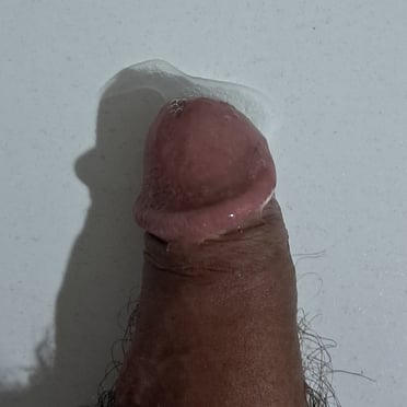Beautifully wet and veiny 8.5cm dick pic with dark skin and thick pubic hair.