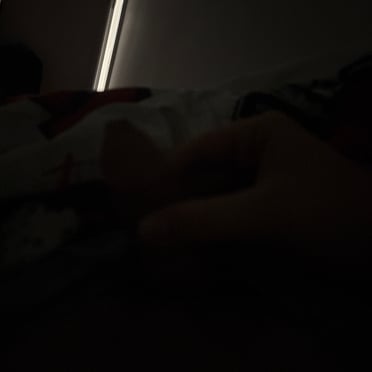 A thick, veiny cock peeking from under the sheets, hot Slovenian pics.