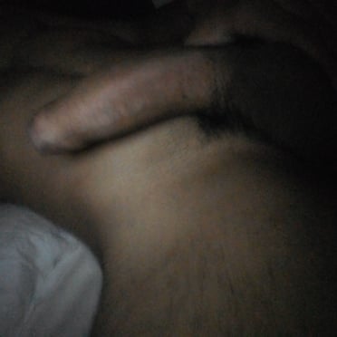 Here is an SEO-friendly alt text description for your image:

A thick, juicy dick from a muscled stud, with light bush on display, this pic is a must-see.