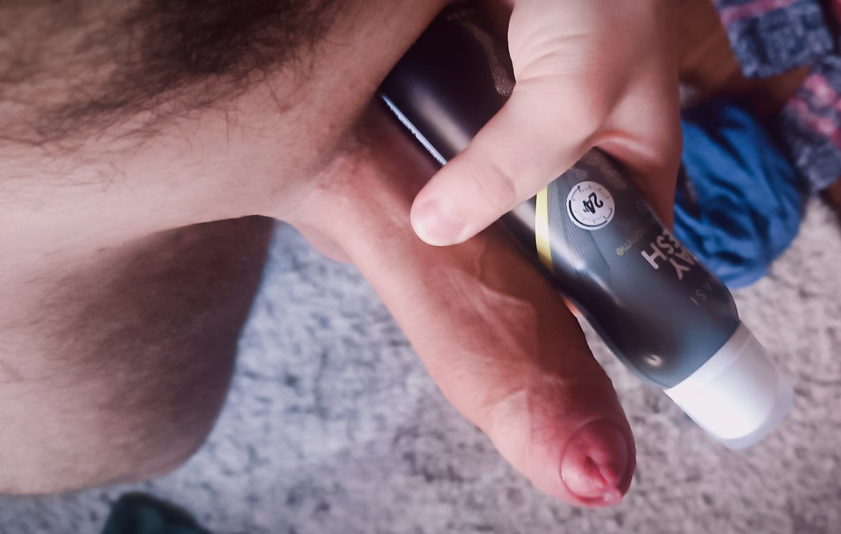 A beautiful, thick, veiny cock with hairy pubic hair.