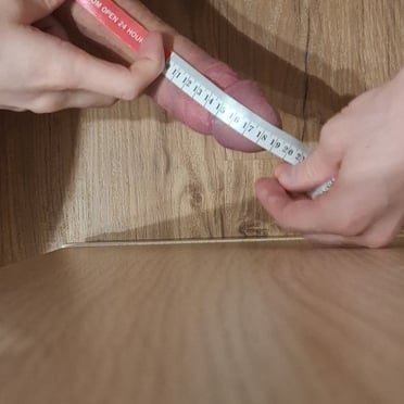 Beautifully veiny cock measuring 19cm, showcasing a hairy pubic area in this Austrian pic.